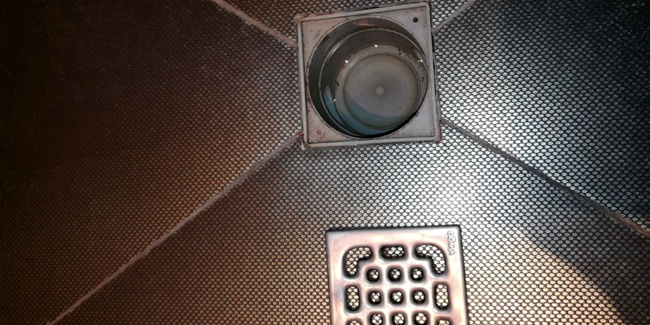 Comment remplacer une bonde de douche ?